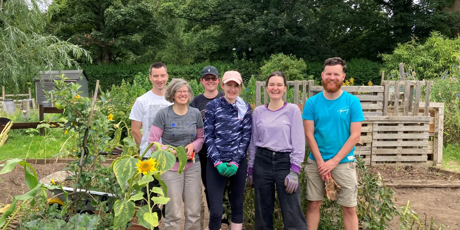 Group of people enjoying the sustainable garden